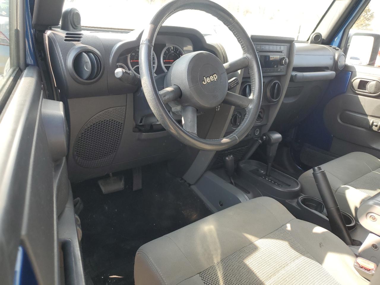 2009 Jeep Wrangler VIN 1J4GA69179L763259 Copart auction photo, front end damage thumbnail 8