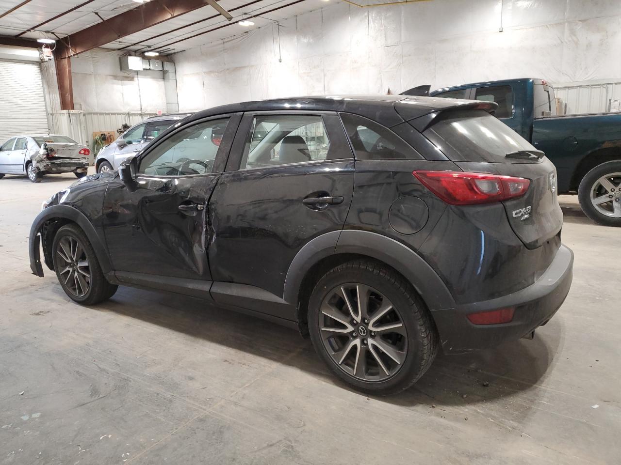 2017 Mazda CX-3 VIN JM1DKFC75H0147515 Copart auction photo, side damage thumbnail 2