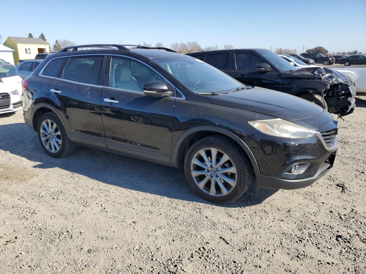 2015 Mazda CX-9 VIN JM3TB3DV7F0466085 Copart auction photo, vandalism damage thumbnail 4