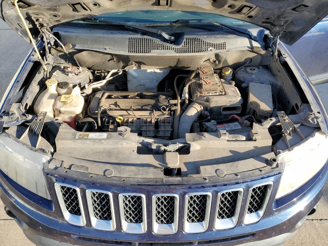 2014 Jeep Compass VIN 1C4NJCBA3ED725764 Copart auction photo, rear end / front end damage thumbnail 12