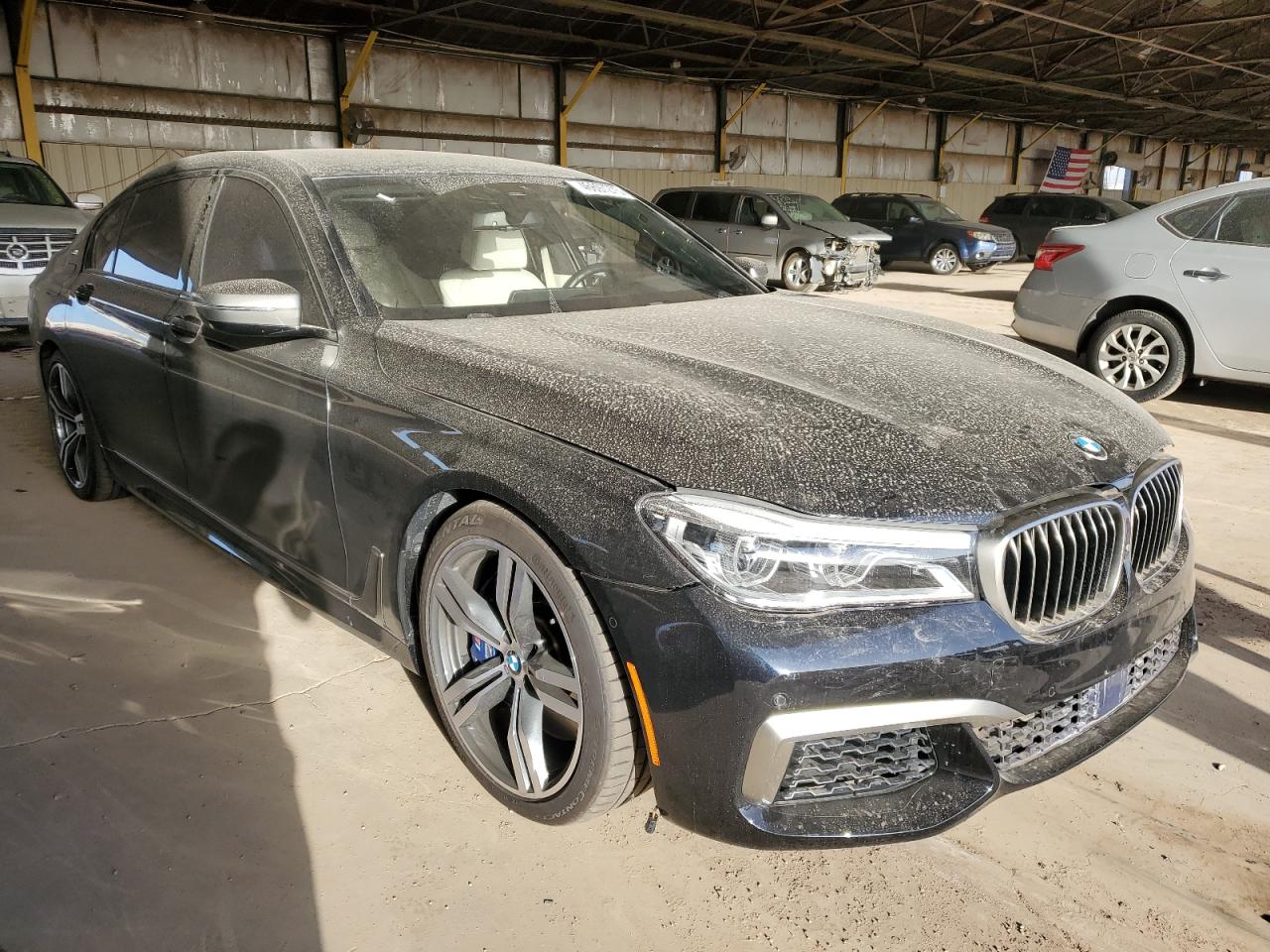2018 BMW 7er VIN WBA7H6C57JG614681 Copart auction photo, front end damage thumbnail 4