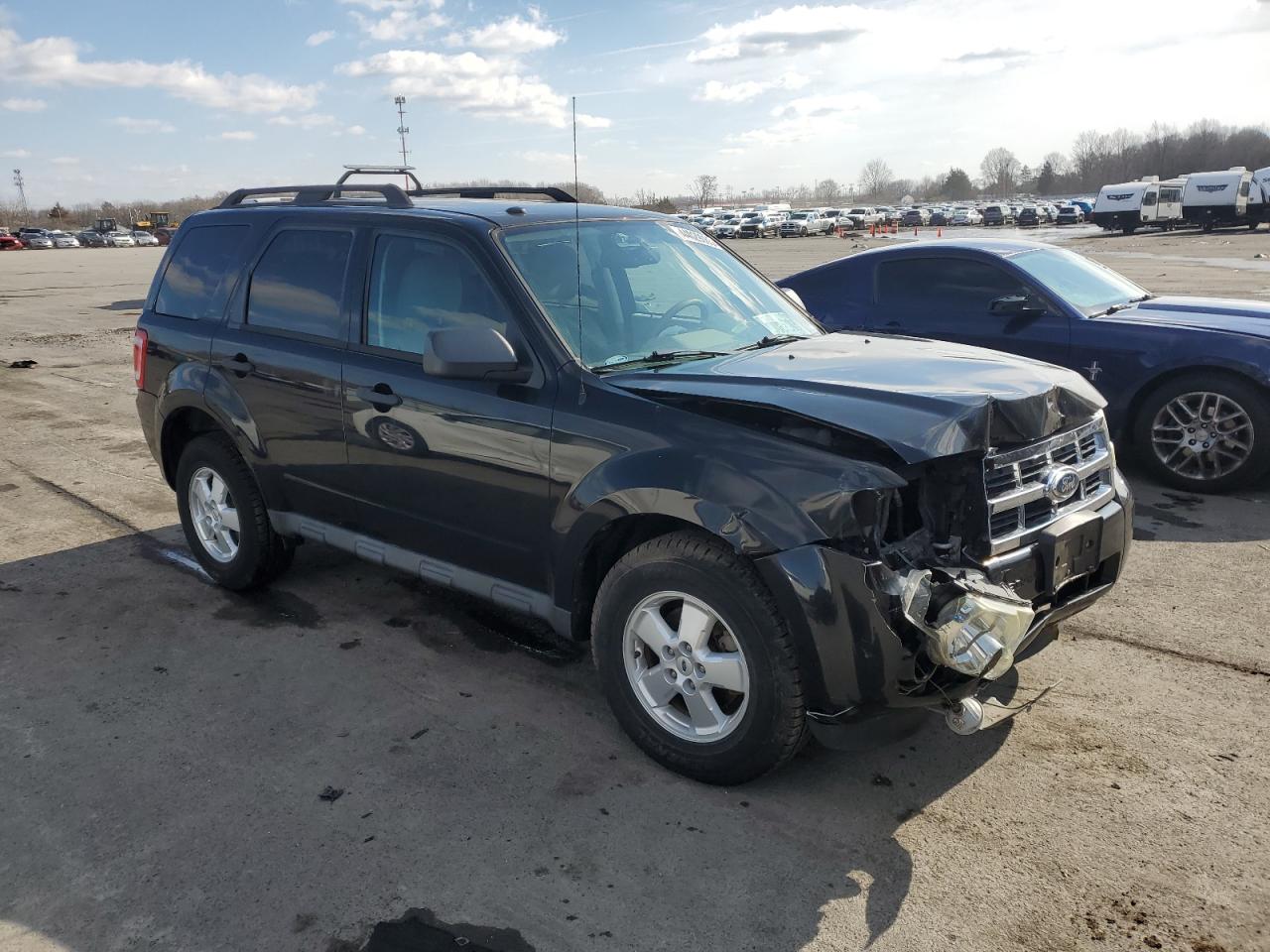 2011 Ford Escape VIN 1FMCU0D71BKA90710 Copart auction photo, front end / side damage thumbnail 4