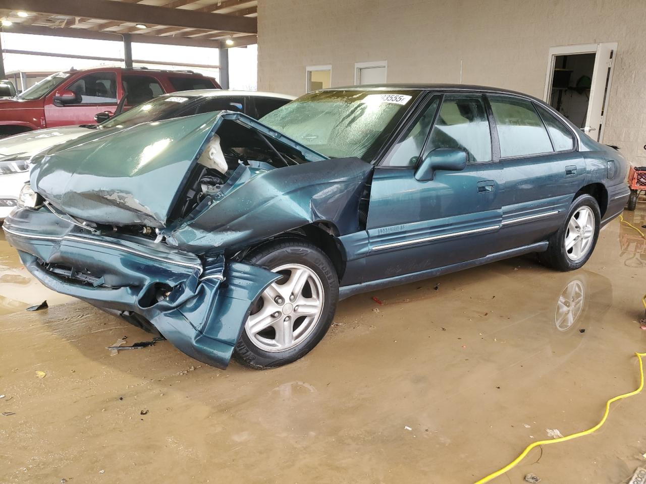 1997 Pontiac Bonneville VIN 1G2HX52K4VH250252 - Copart auction photo