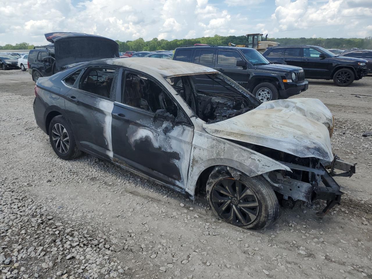 2023 Volkswagen Jetta VIN 3VW5M7BU7PM047677 Copart auction photo, burn damage thumbnail 4