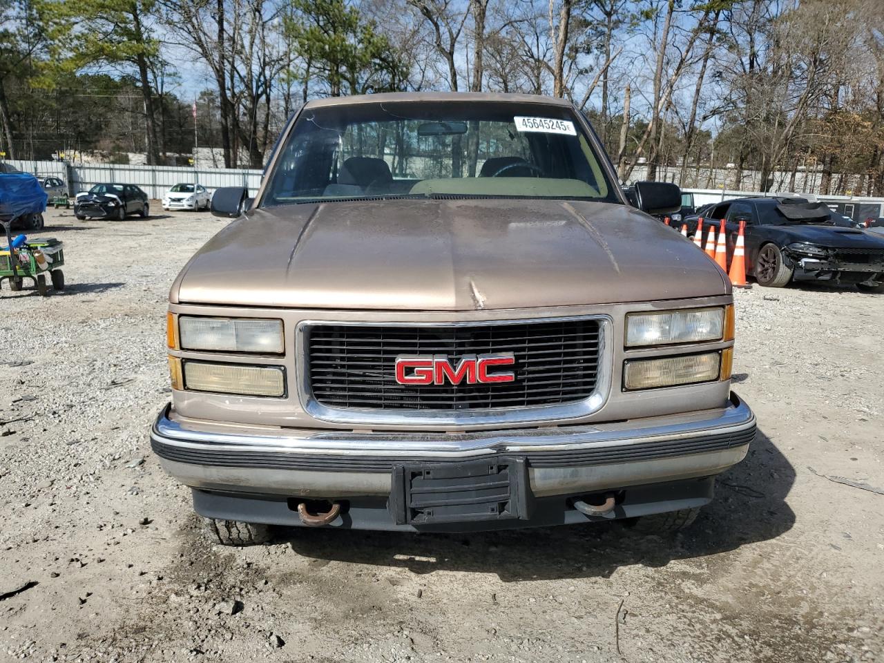 1995 GMC Sierra VIN 1GTEK19K6SE543949 Copart auction photo, rear end / all over damage thumbnail 5