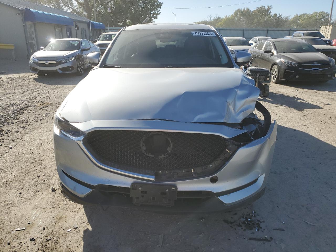 2019 Mazda CX-5 VIN JM3KFADM4K1549151 Copart auction photo, front end / minor dent/scratches damage thumbnail 5