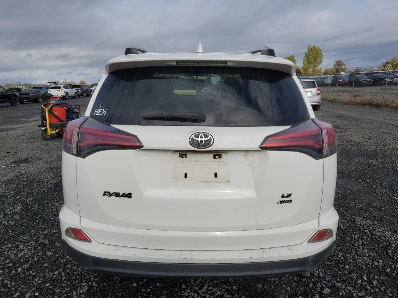 2016 Toyota RAV 4 VIN JTMBFREV9GJ069211 Copart auction photo, all over damage thumbnail 6