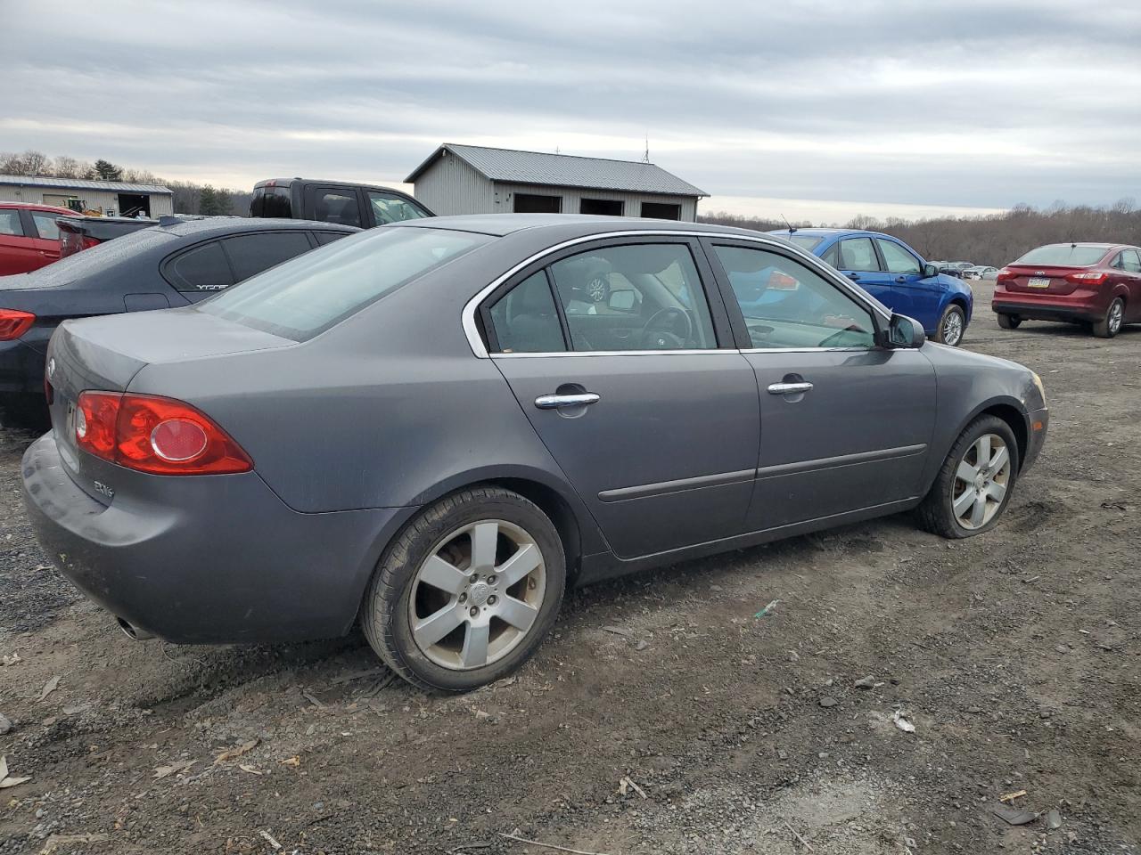 2007 KIA Optima VIN KNAGE124375143282 Copart auction photo, minor dent/scratches damage thumbnail 3