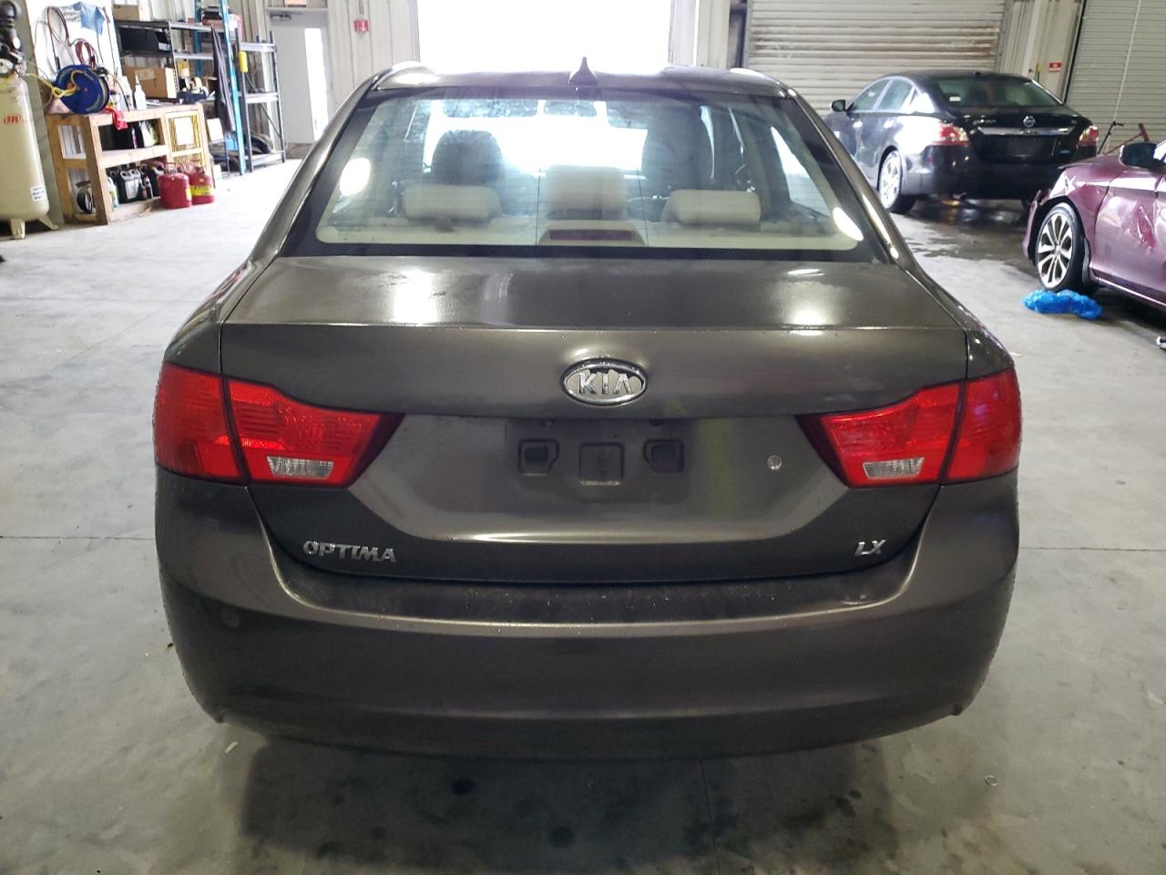 2009 KIA Optima VIN KNAGE228595332141 Copart auction photo, side damage thumbnail 6