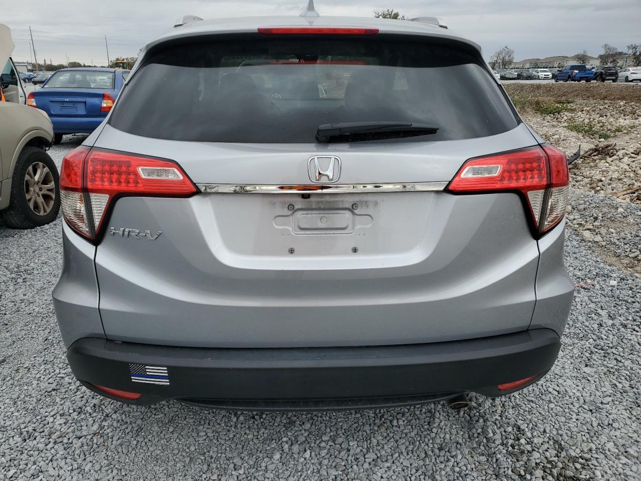 2019 Honda HR-V VIN 3CZRU5H73KM721319 Copart auction photo, side / front end damage thumbnail 6