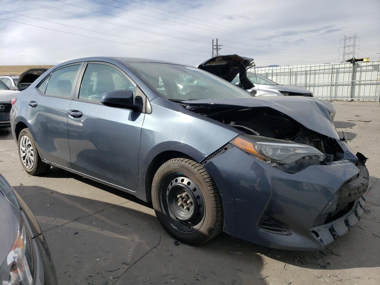 2019 Toyota Corolla VIN 2T1BURHE8KC170777 Copart auction photo, front end / side damage thumbnail 4