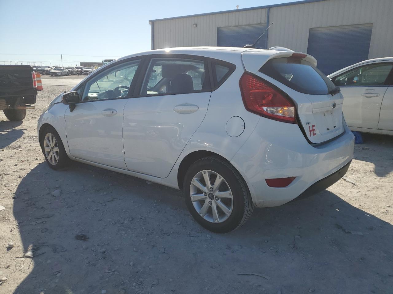 2013 Ford Fiesta VIN 3FADP4EJ0DM109606 Copart auction photo, front end / rear end damage thumbnail 2