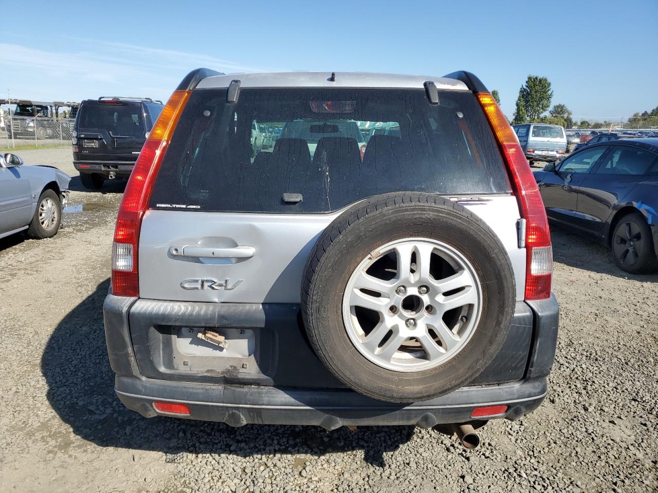 2004 Honda CR-V VIN JHLRD78894C038199 Copart auction photo, side / front end damage thumbnail 6
