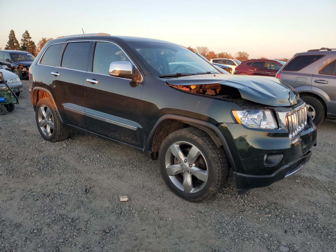 2011 Jeep Grand Cherokee VIN 1J4RR5GT7BC656735 Copart auction photo, front end damage thumbnail 4