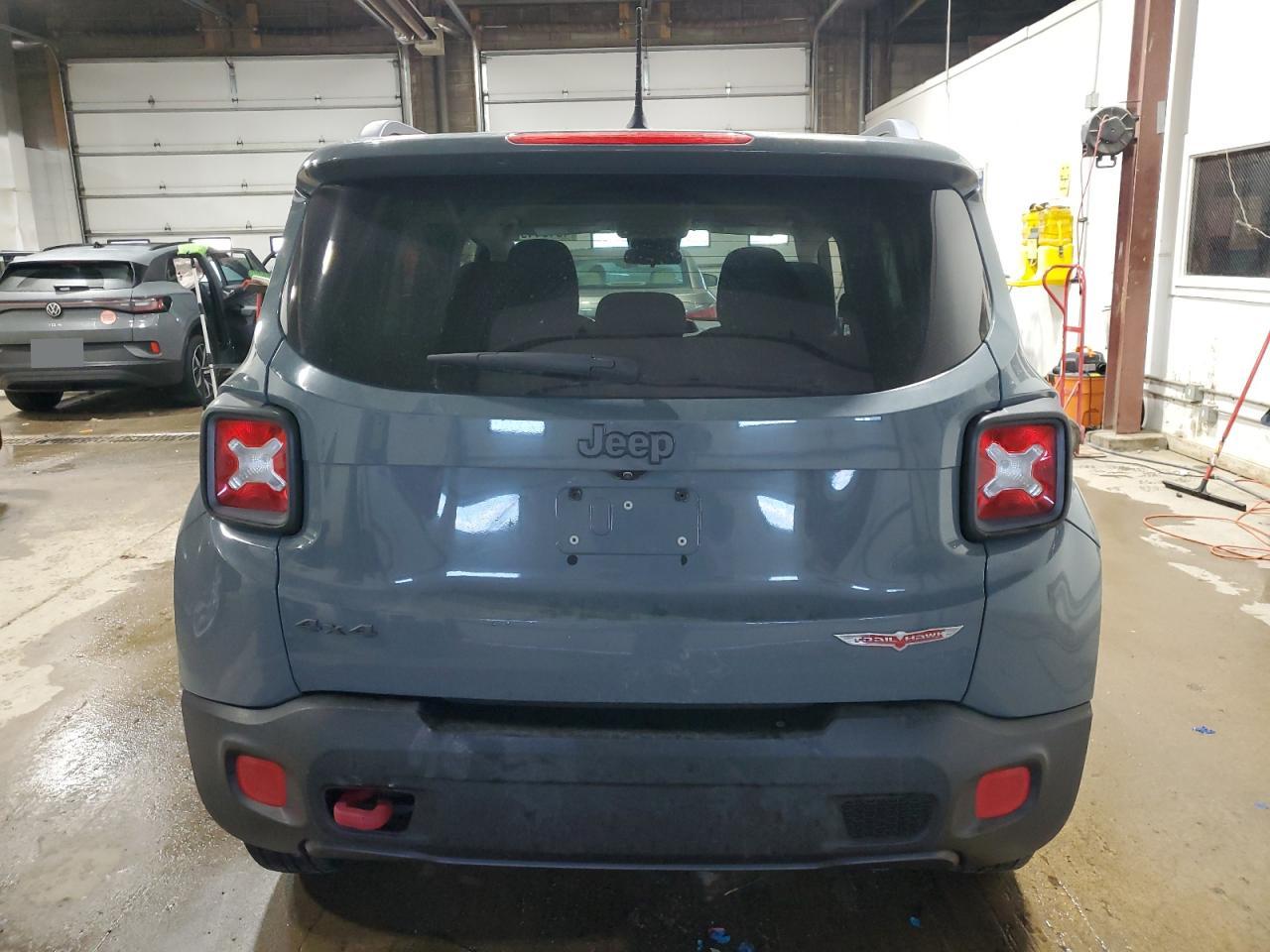 2015 Jeep Renegade VIN ZACCJBCT0FPC00312 Copart auction photo, side / front end damage thumbnail 6