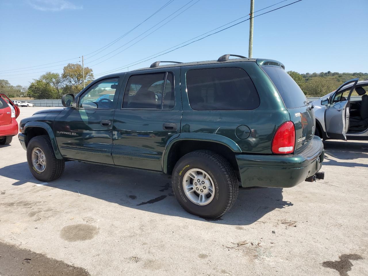 1999 Dodge Durango VIN 1B4HS28Y5XF625355 Copart auction photo, side / front end damage thumbnail 2