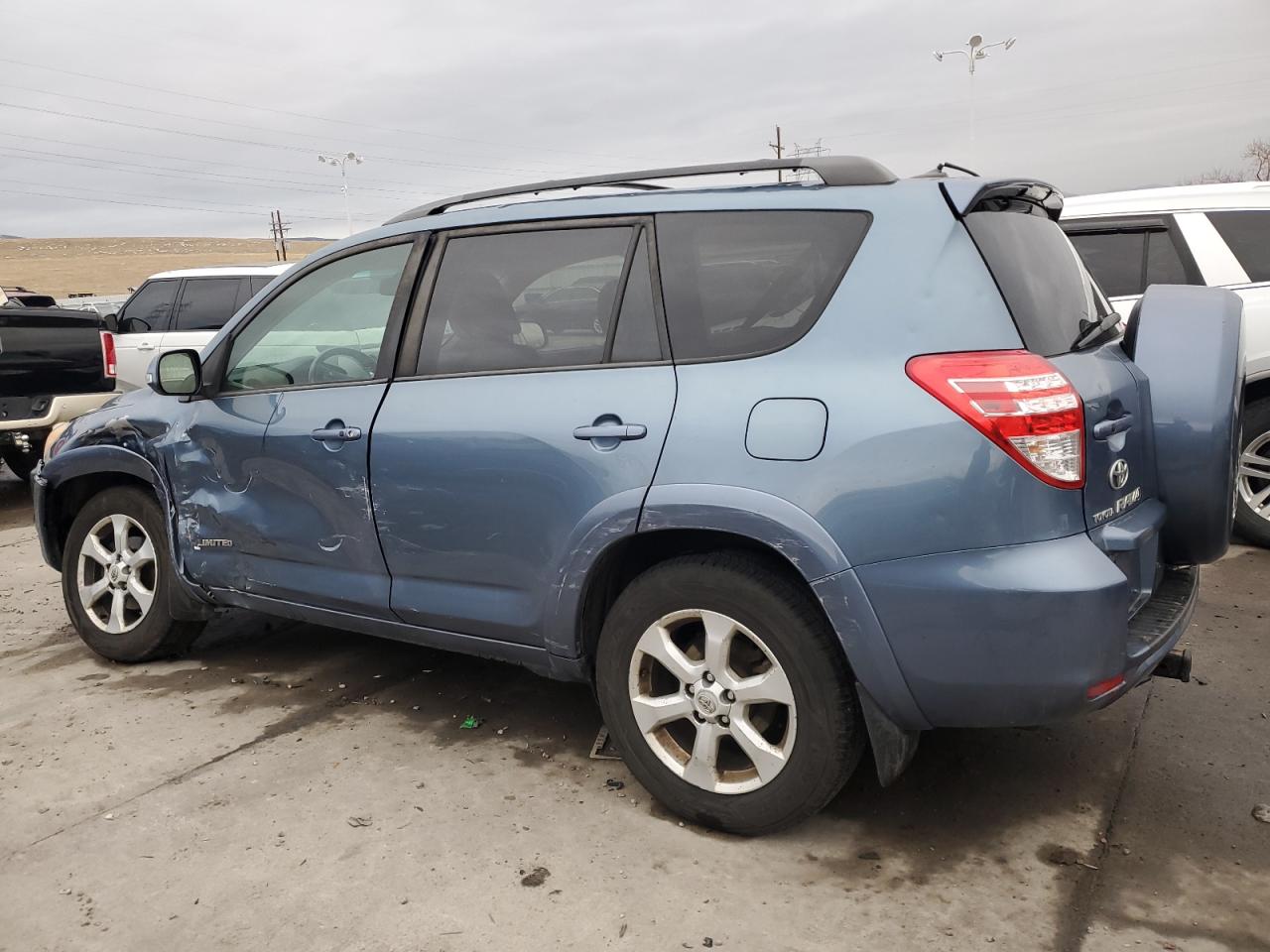 2010 Toyota RAV 4 VIN 2T3DK4DV8AW030479 Copart auction photo, side / front end damage thumbnail 2