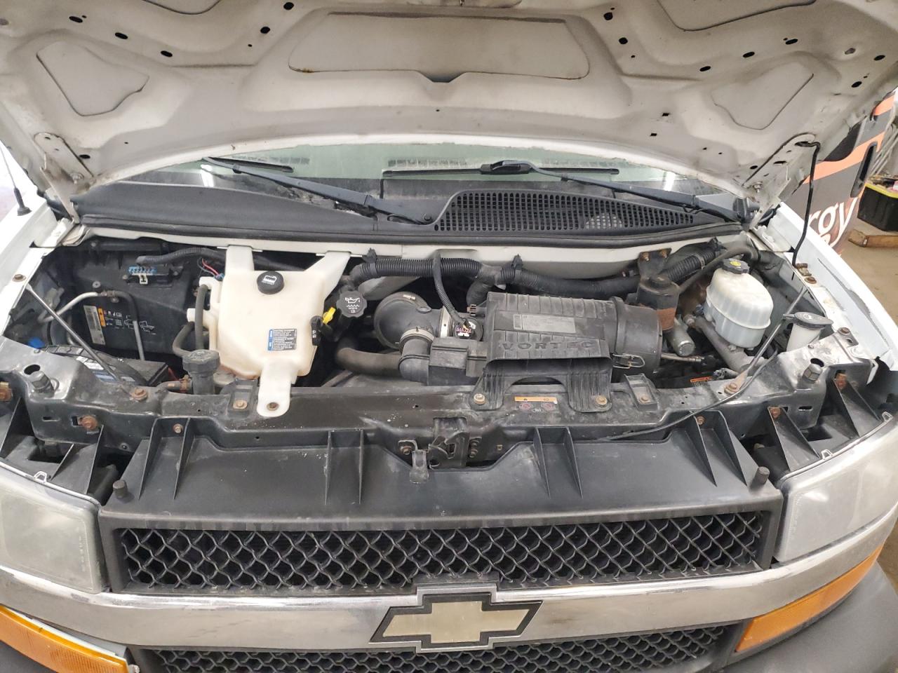 2012 Chevrolet Express VIN 1GCSHAF45C1119324 Copart auction photo, side / front end damage thumbnail 11