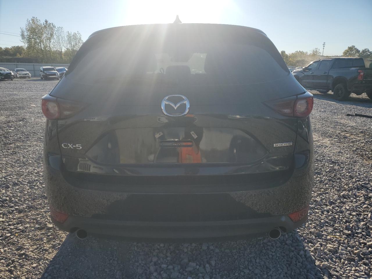 2021 Mazda CX-5 VIN JM3KFACM3M0321796 Copart auction photo, side damage thumbnail 6