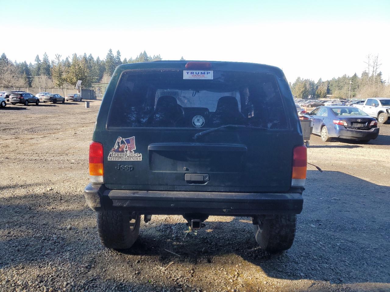 1999 Jeep Grand Cherokee VIN 1J4FF27S9XL667941 Copart auction photo, all over damage thumbnail 6