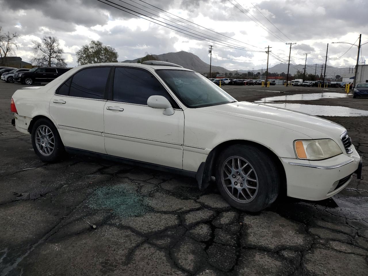 2001 Acura RL VIN JH4KA96671C001294 Copart auction photo, rear end damage thumbnail 4