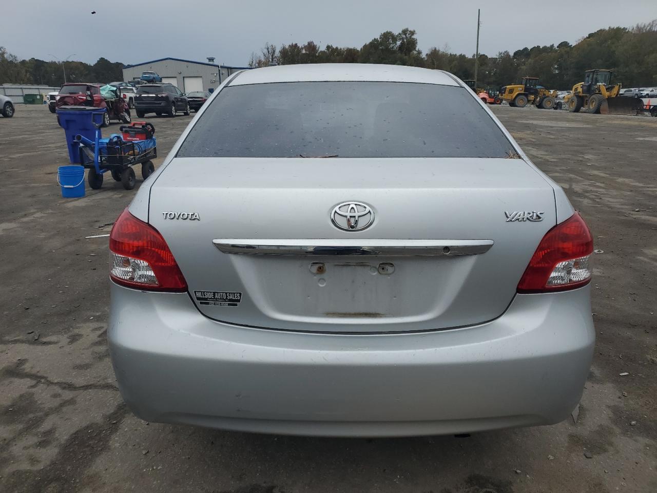 2009 Toyota Yaris VIN JTDBT903691314158 Copart auction photo, front end / side damage thumbnail 6