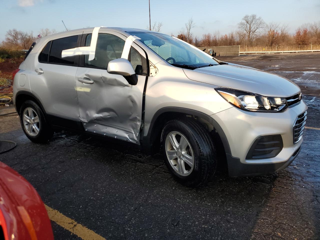 2020 Chevrolet Trax VIN 3GNCJKSB9LL337883 Copart auction photo, side damage thumbnail 4