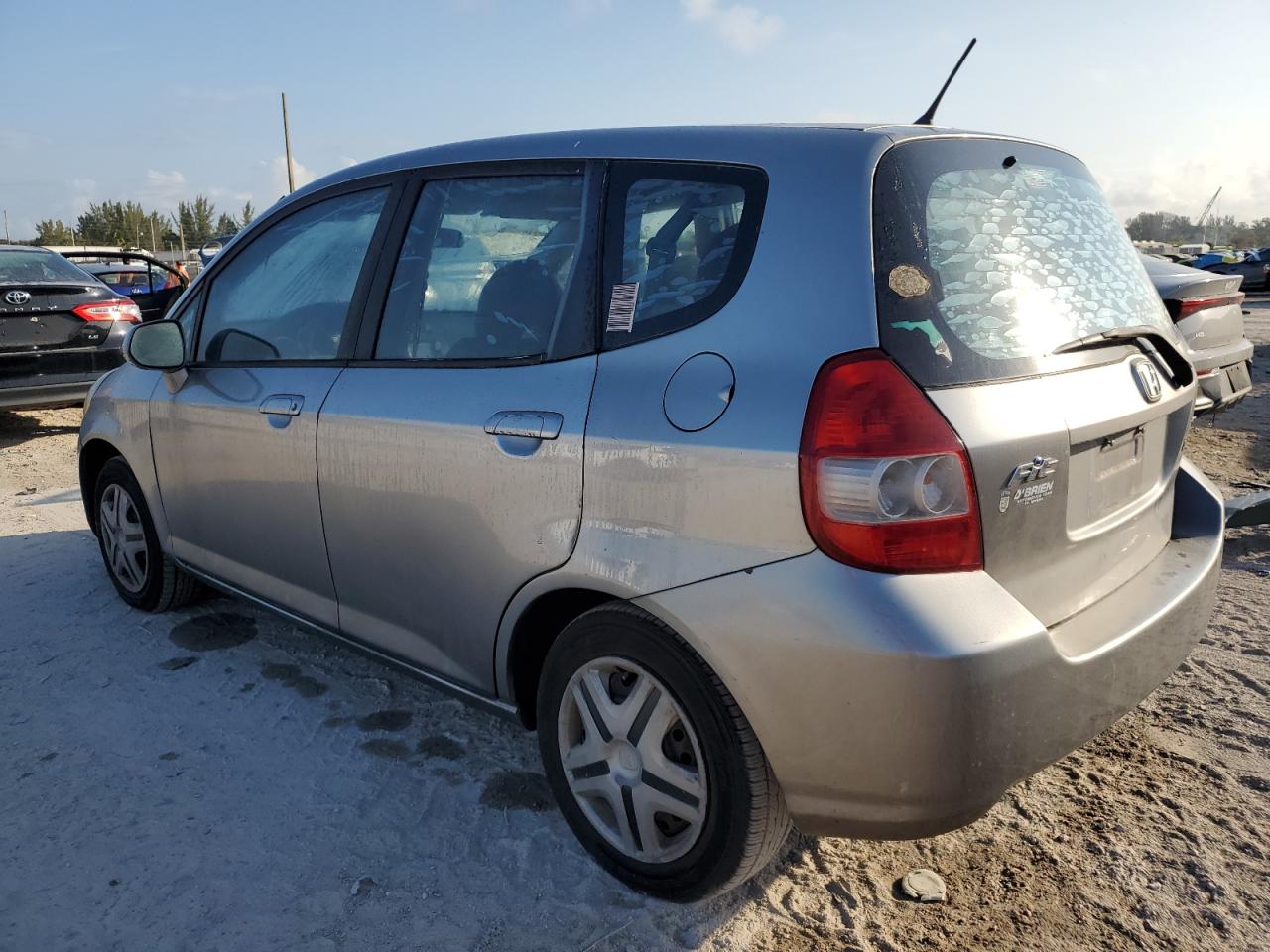 2008 Honda Fit VIN JHMGD38478S037945 Copart auction photo, side / rear end damage thumbnail 2