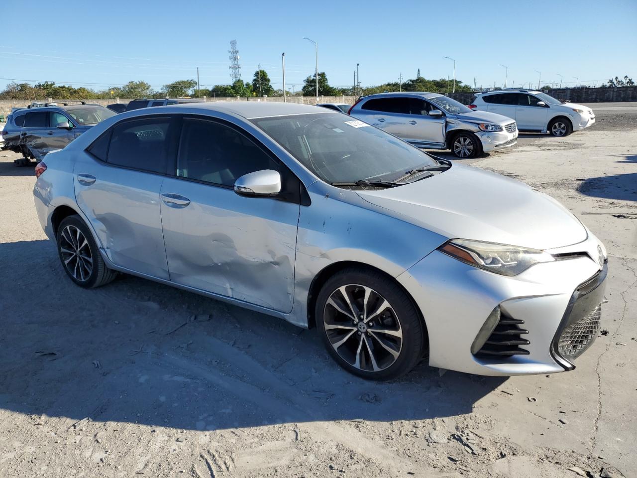 2017 Toyota Corolla VIN 2T1BURHEXHC887187 Copart auction photo, all over damage thumbnail 4
