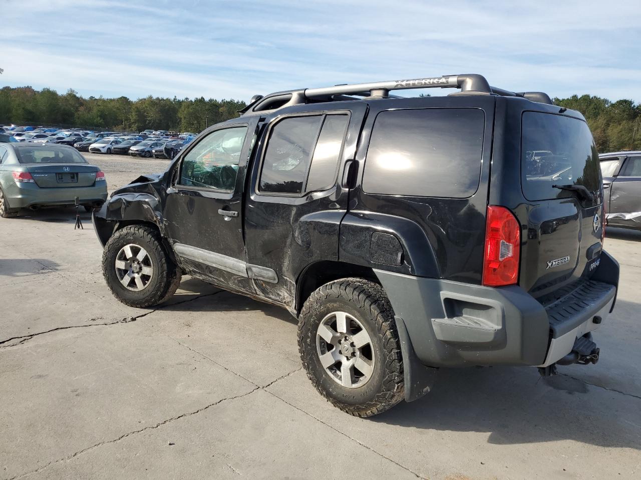 2011 Nissan XTerra VIN 5N1AN0NW8BC524674 Copart auction photo, all over damage thumbnail 2