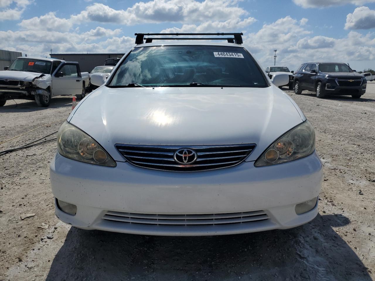 2005 Toyota Camry VIN 4T1BE30K25U431271 Copart auction photo, side damage thumbnail 5