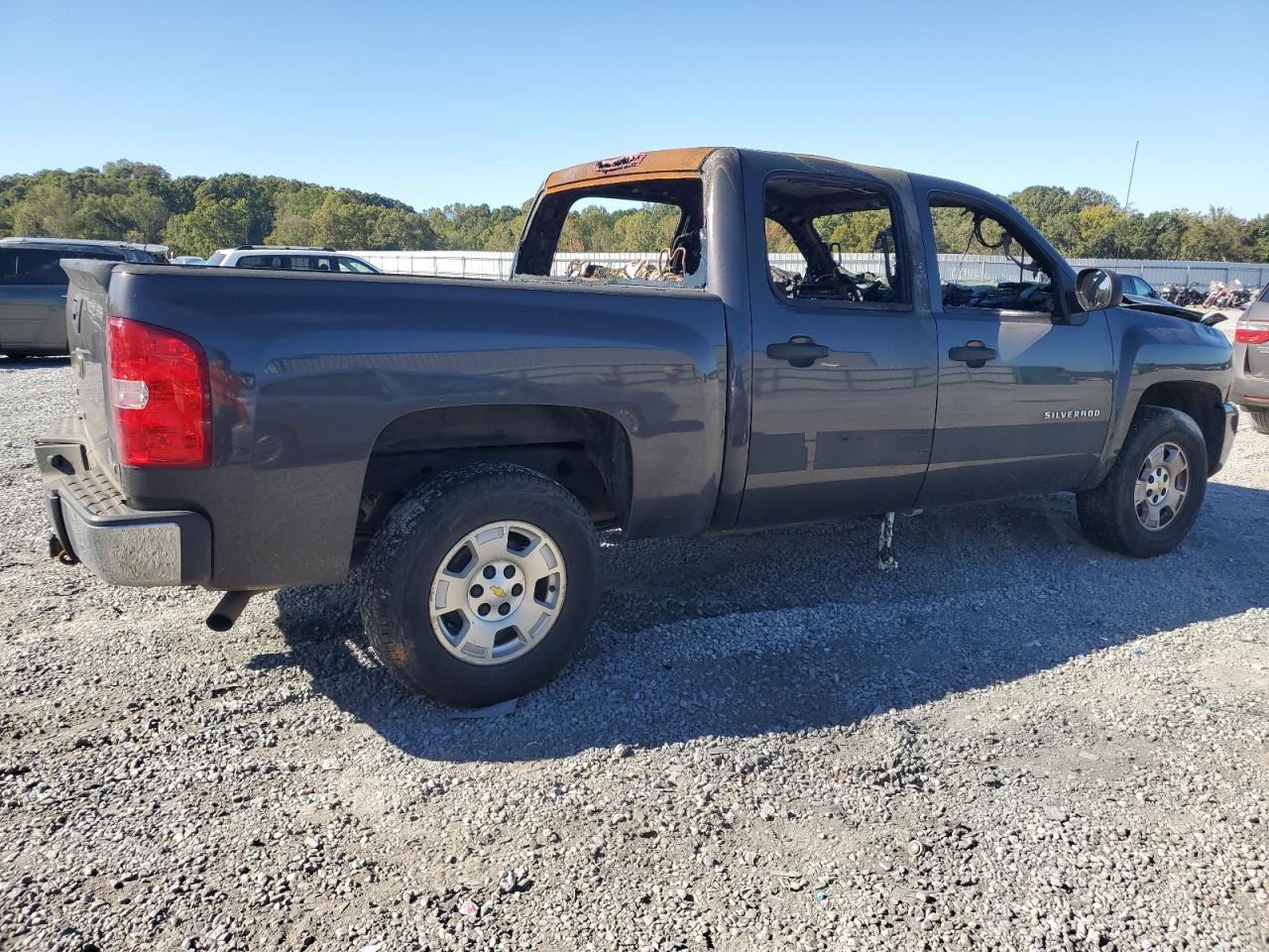 2011 Chevrolet Silverado VIN 3GCPCSE01BG173423 Copart auction photo, burn - interior damage thumbnail 3