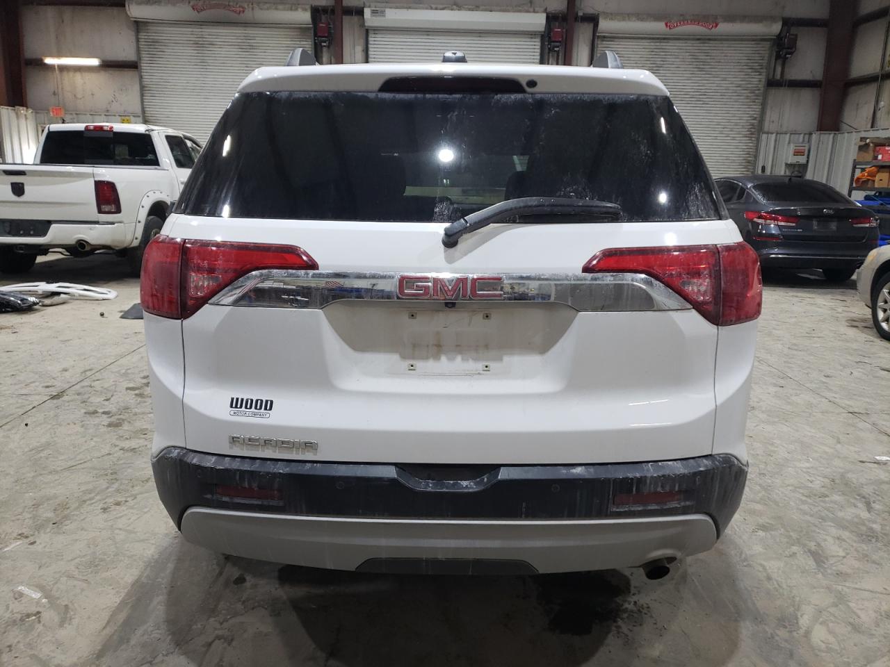 2019 GMC Acadia VIN 1GKKNLLA2KZ279910 Copart auction photo, front end / minor dent/scratches damage thumbnail 6