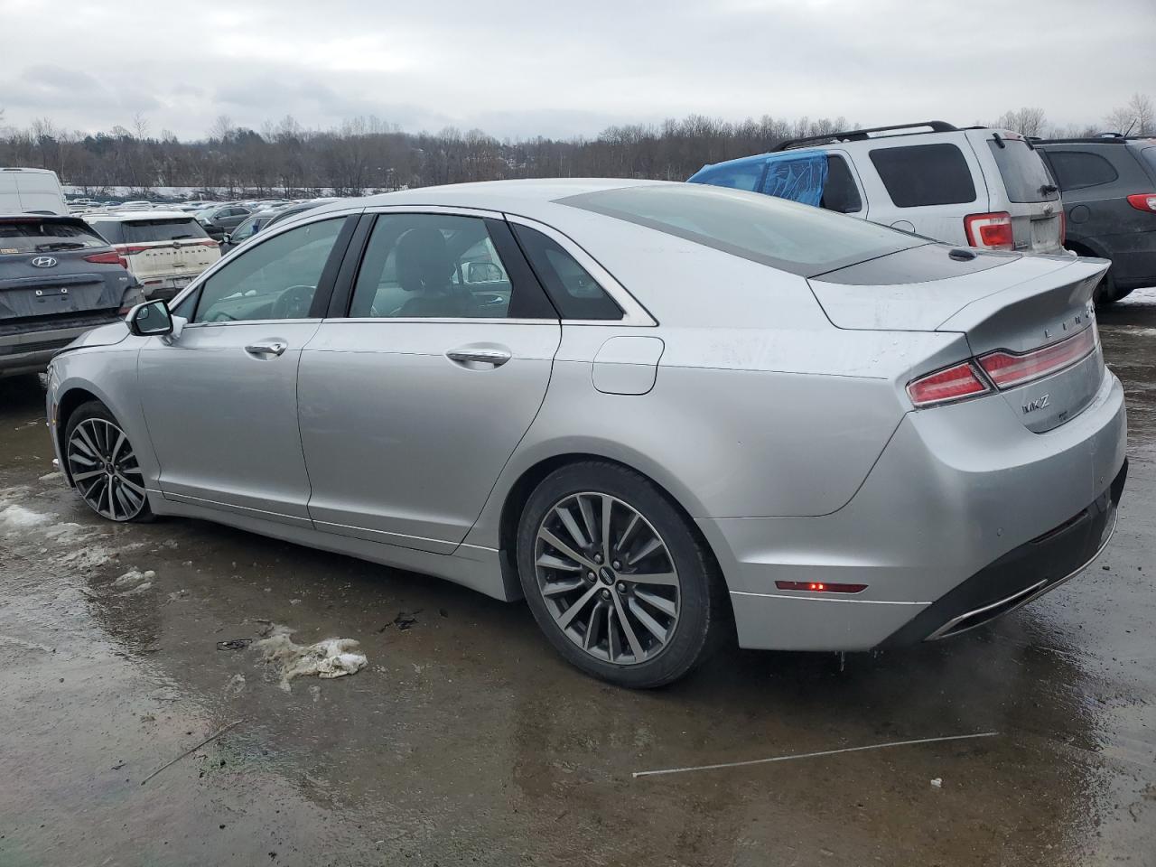 2017 Lincoln MKZ VIN 3LN6L5B90HR649394 Copart auction photo, side / front end damage thumbnail 2