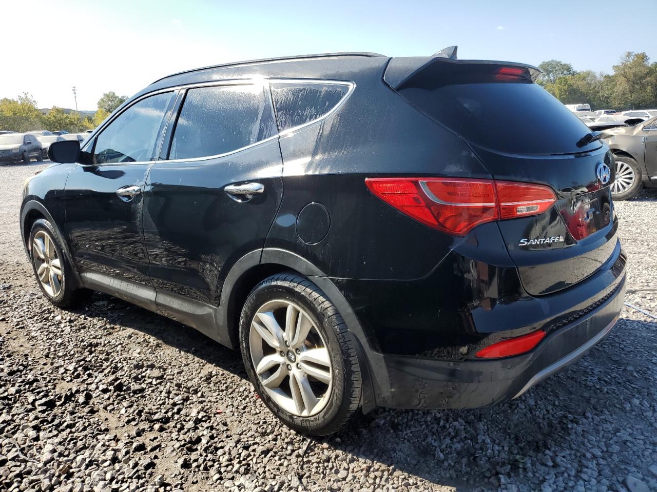 2016 Hyundai Santa Fe VIN 5XYZW4LA1GG348878 Copart auction photo, burn - engine damage thumbnail 2