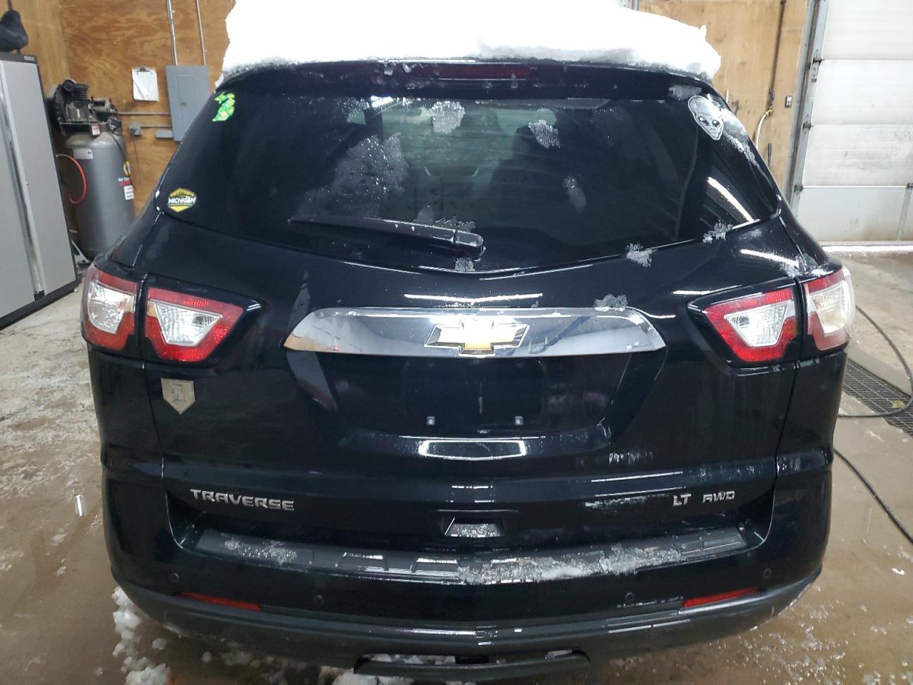 2016 Chevrolet Traverse VIN 1GNKVGKDXGJ166282 Copart auction photo, front end / minor dent/scratches damage thumbnail 6