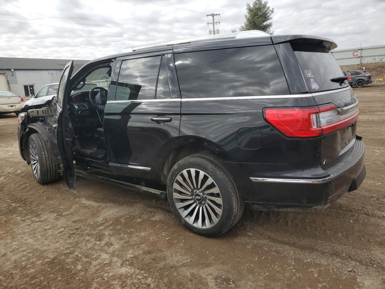 2021 Lincoln Navigator VIN 5LMJJ2LT8MEL11194 Copart auction photo, side / front end damage thumbnail 2