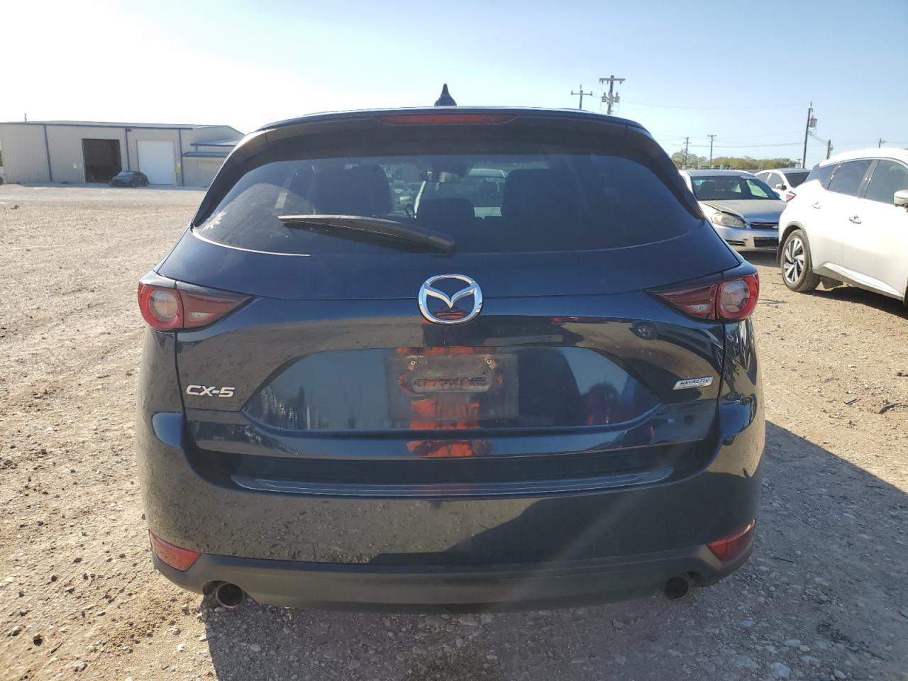 2018 Mazda CX-5 VIN JM3KFACM8J0339528 Copart auction photo, front end / undercarriage damage thumbnail 6