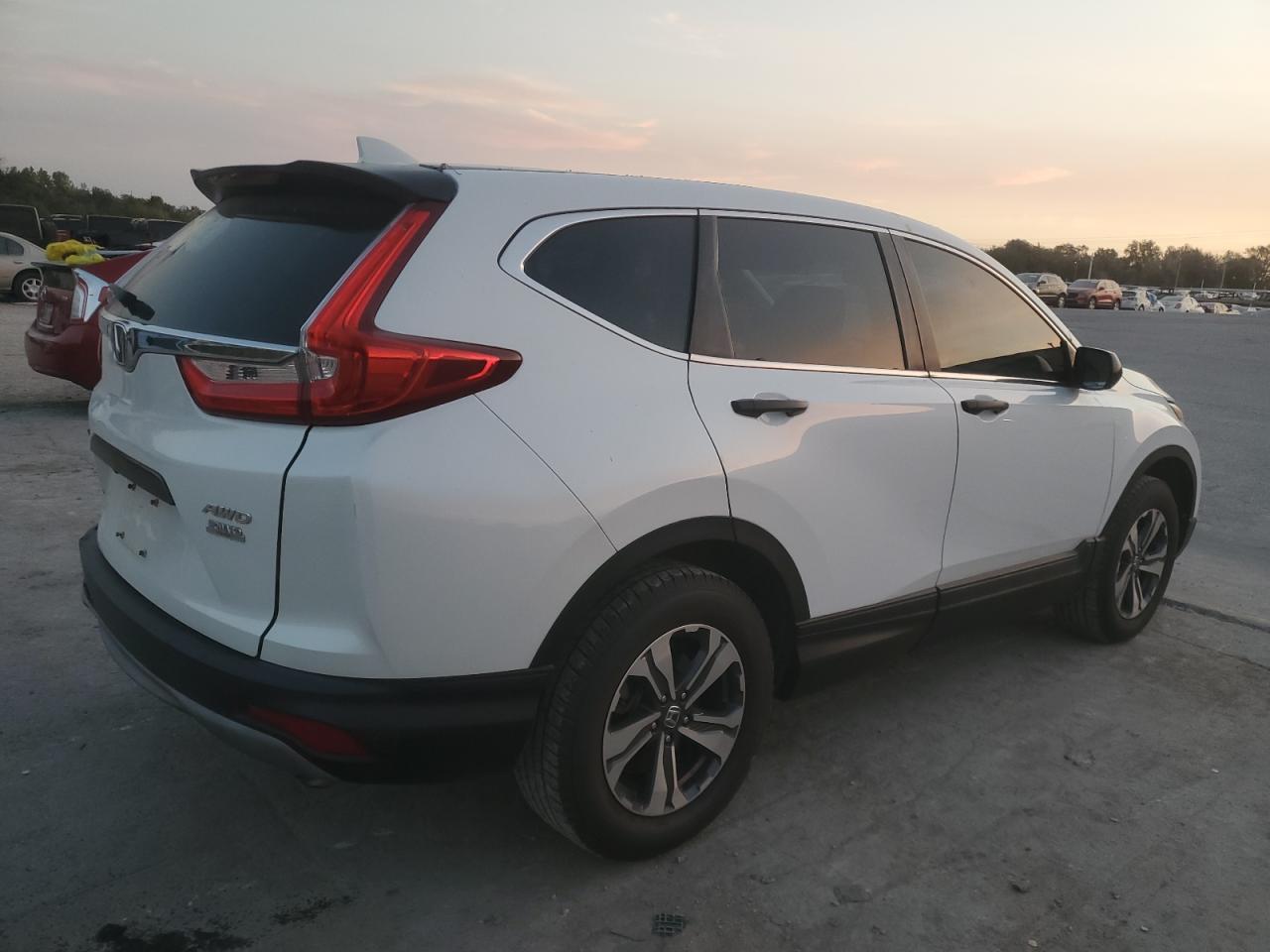 2019 Honda CR-V VIN 2HKRW6H37KH204730 Copart auction photo, side / minor dent/scratches damage thumbnail 3