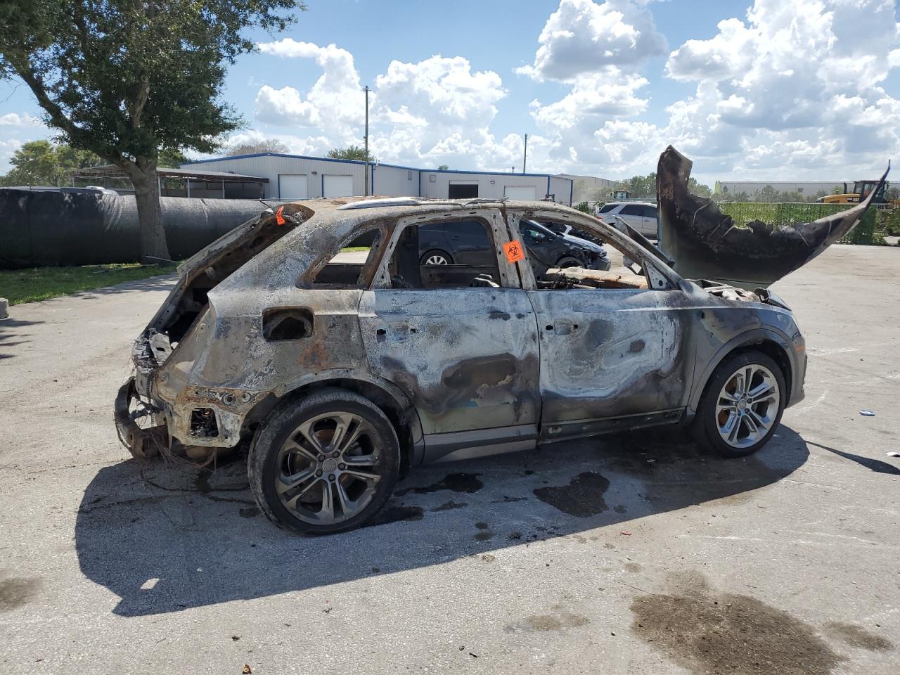 2016 Audi Q3 VIN WA1GFCFS4GR024437 Copart auction photo, burn damage thumbnail 3
