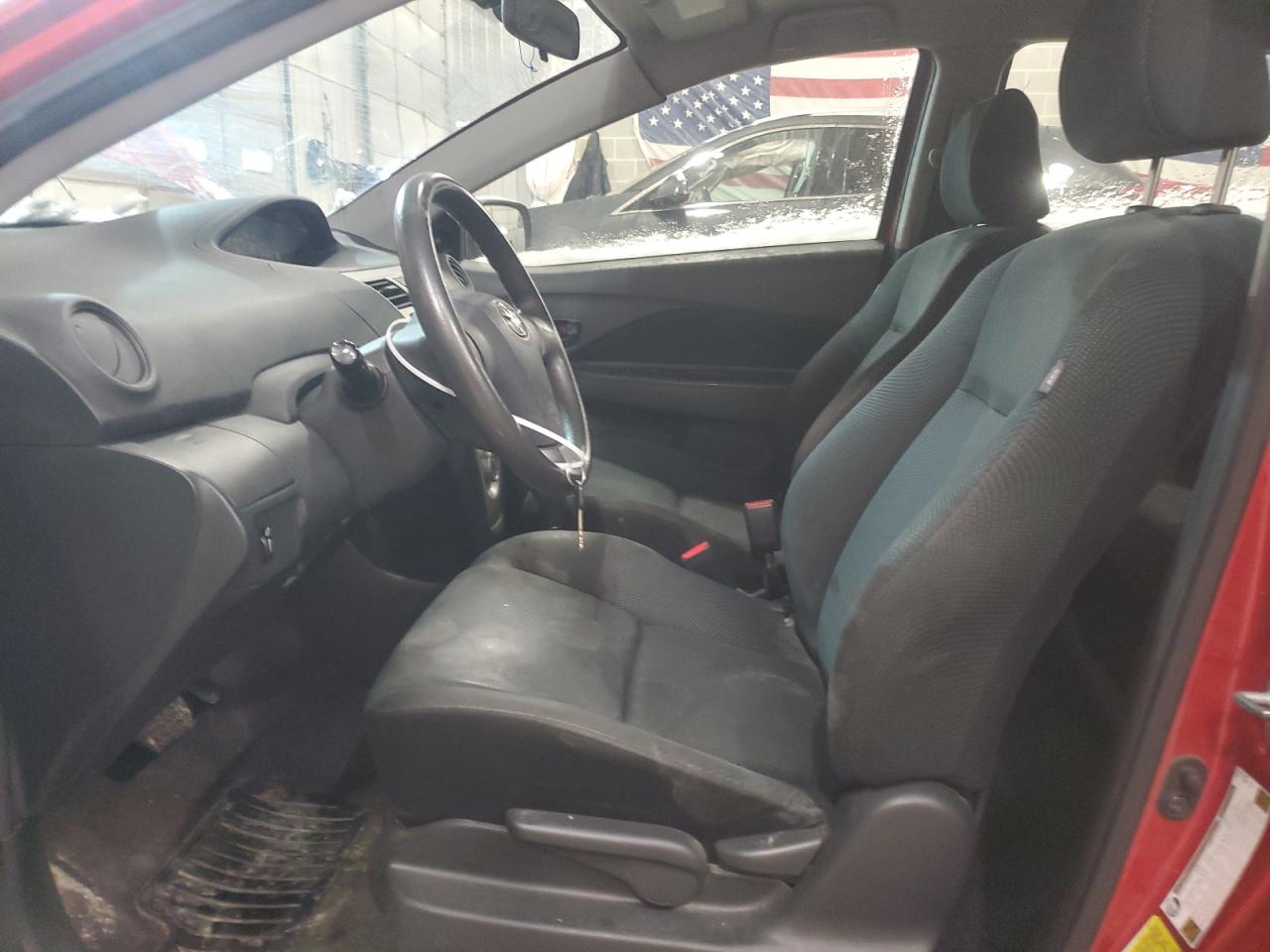 2012 Toyota Yaris VIN JTDBT4K34CL037411 Copart auction photo, front end / hail damage thumbnail 7