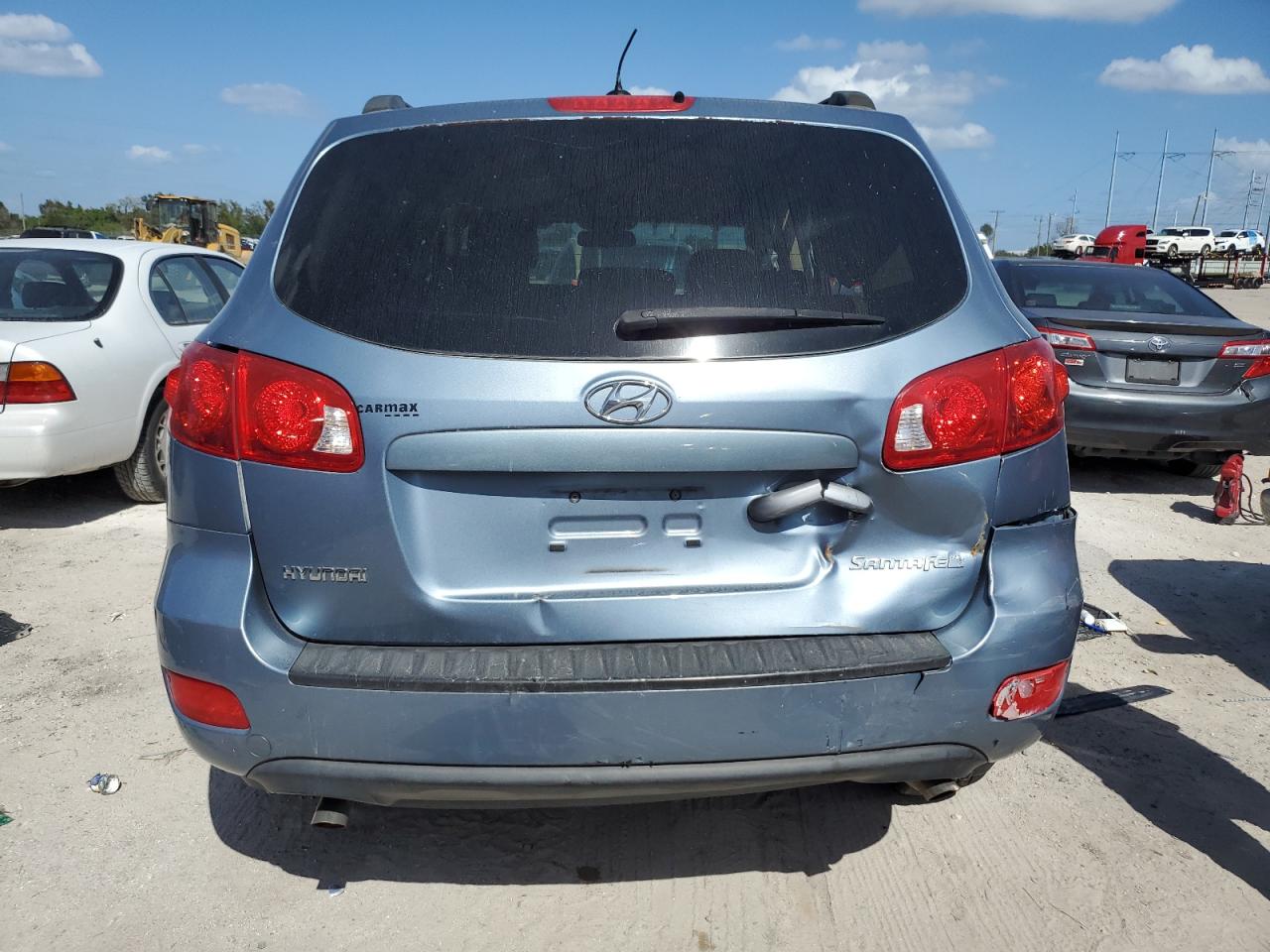 2009 Hyundai Santa Fe VIN 5NMSG13D09H266088 Copart auction photo, side / rear end damage thumbnail 6