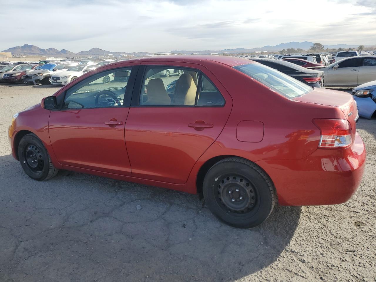 2010 Toyota Yaris VIN JTDBT4K34A1358714 Copart auction photo, side damage thumbnail 2