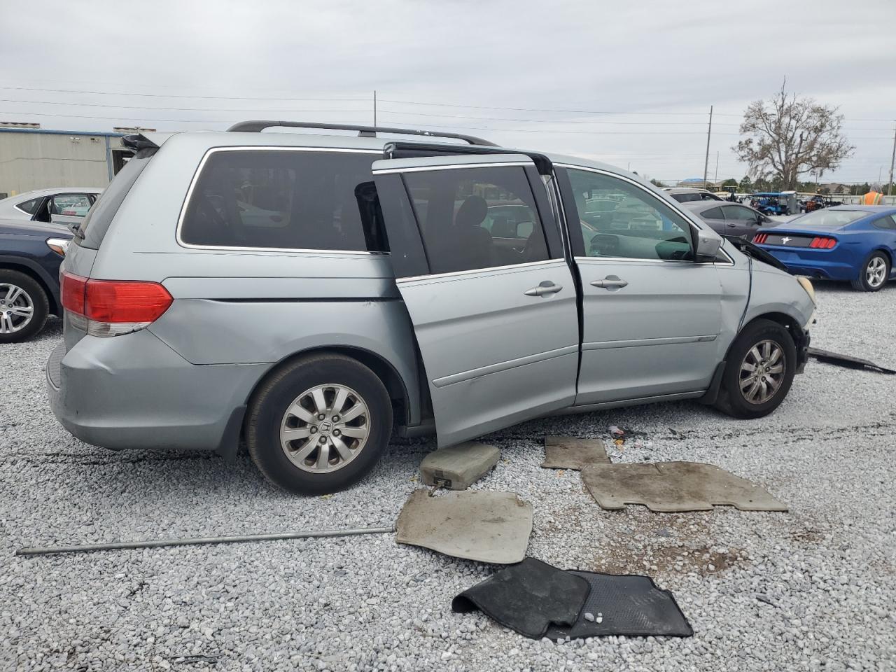 2009 Honda Odyssey VIN 5FNRL38619B051143 Copart auction photo, front end / side damage thumbnail 3