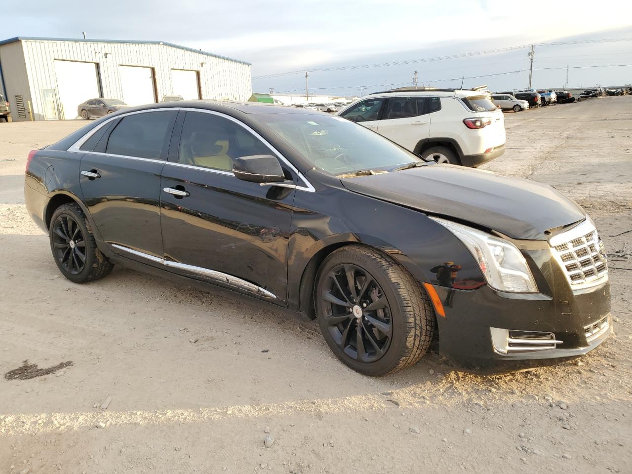 2013 Cadillac XTS VIN 2G61P5S36D9144512 Copart auction photo, front end / side damage thumbnail 4