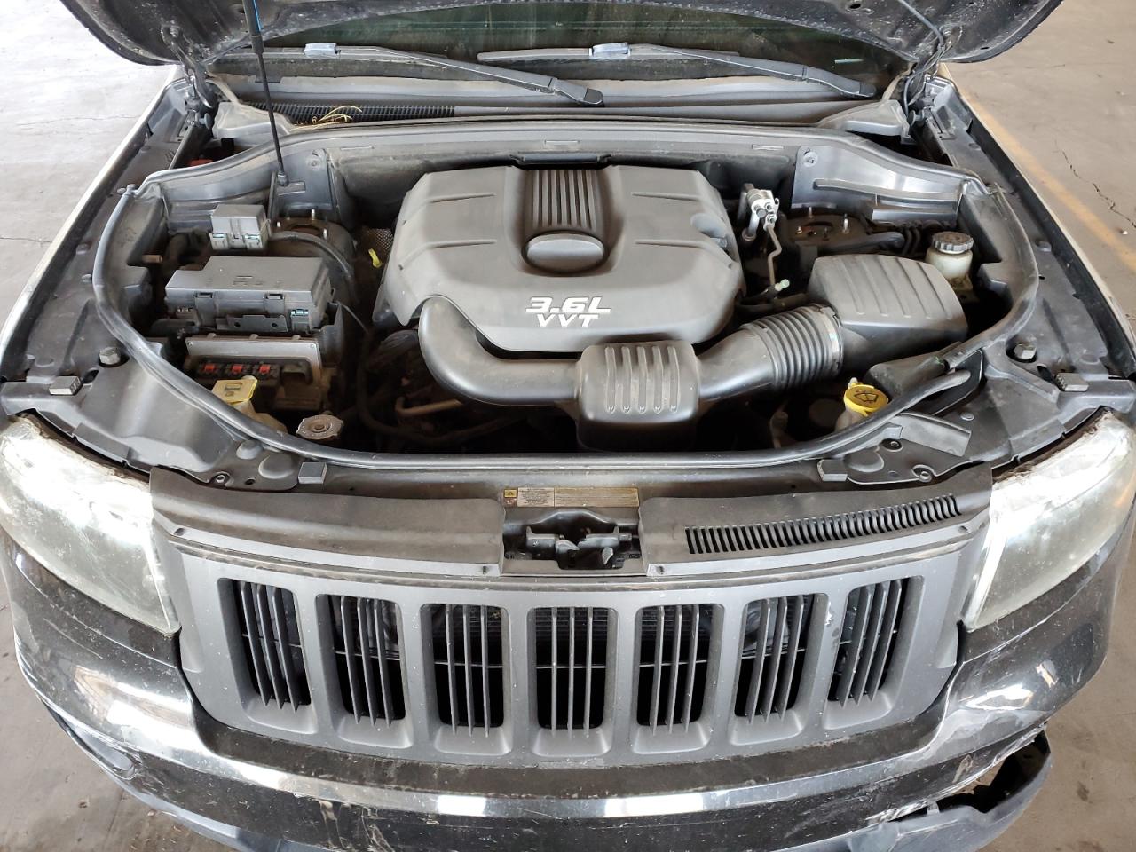 2012 Jeep Grand Cherokee VIN 1C4RJEAGXCC264715 Copart auction photo, front end / rear end damage thumbnail 12