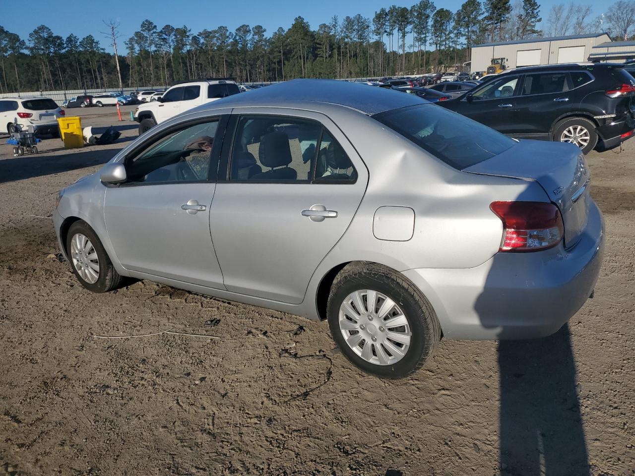 2010 Toyota Yaris VIN JTDBT4K39A4068628 Copart auction photo, side / top/roof damage thumbnail 2