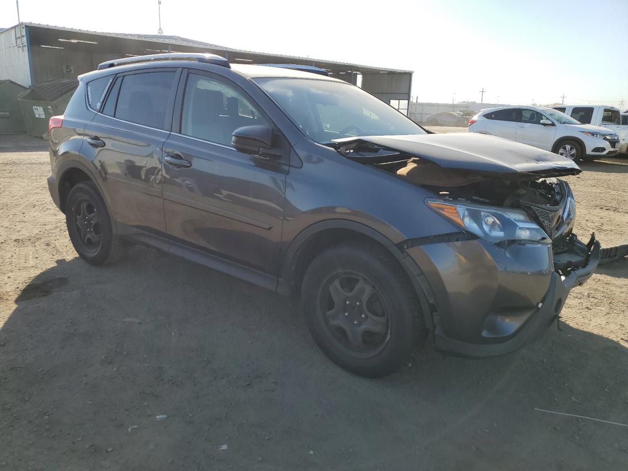 2015 Toyota RAV 4 VIN JTMBFREV0FJ017030 Copart auction photo, front end / side damage thumbnail 4