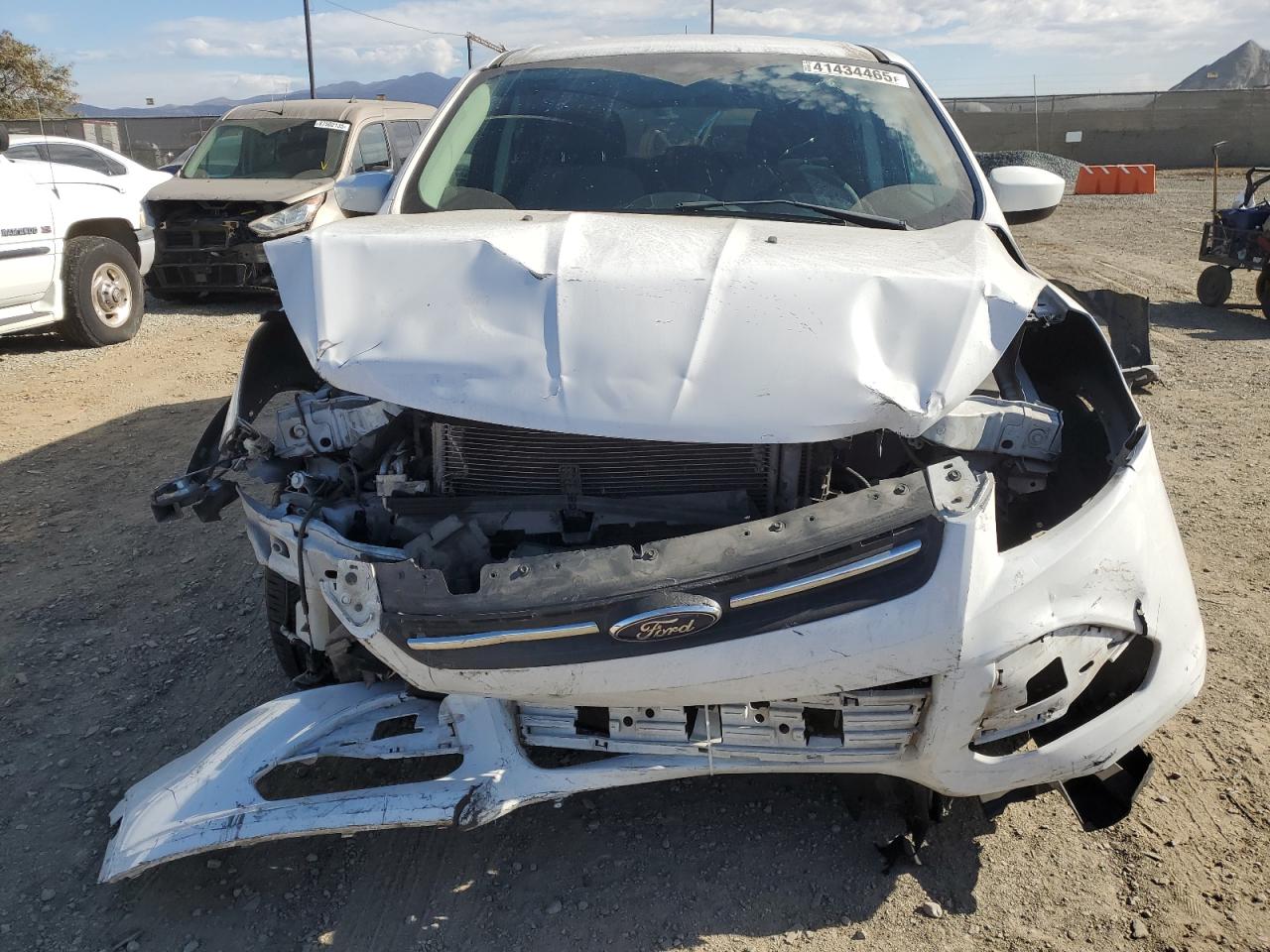 2014 Ford Escape VIN 1FMCU0GX0EUB09090 Copart auction photo, front end damage thumbnail 5