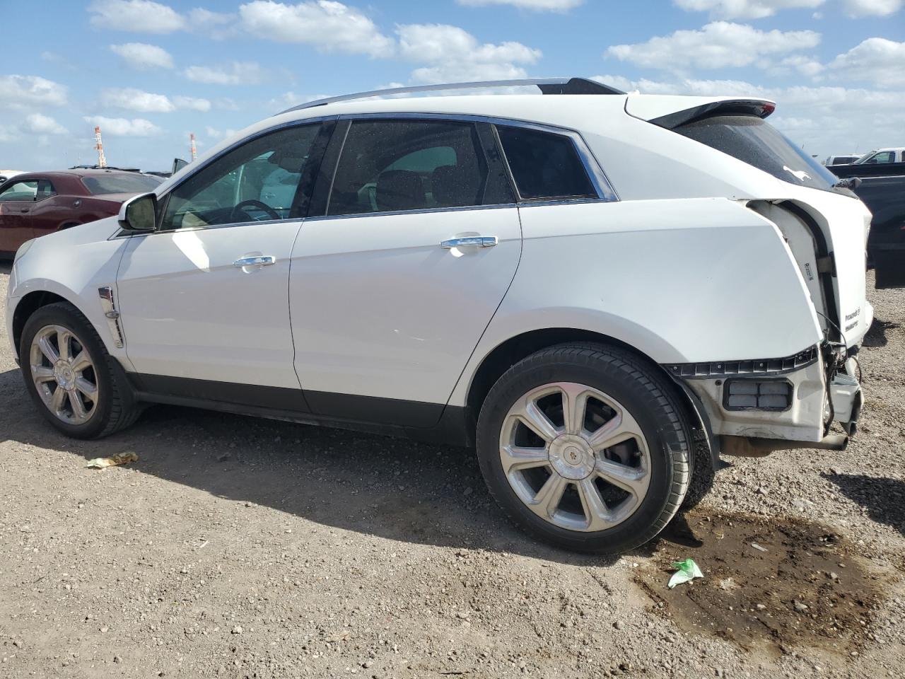 2012 Cadillac SRX VIN 3GYFNBE36CS656611 Copart auction photo, rear end damage thumbnail 2